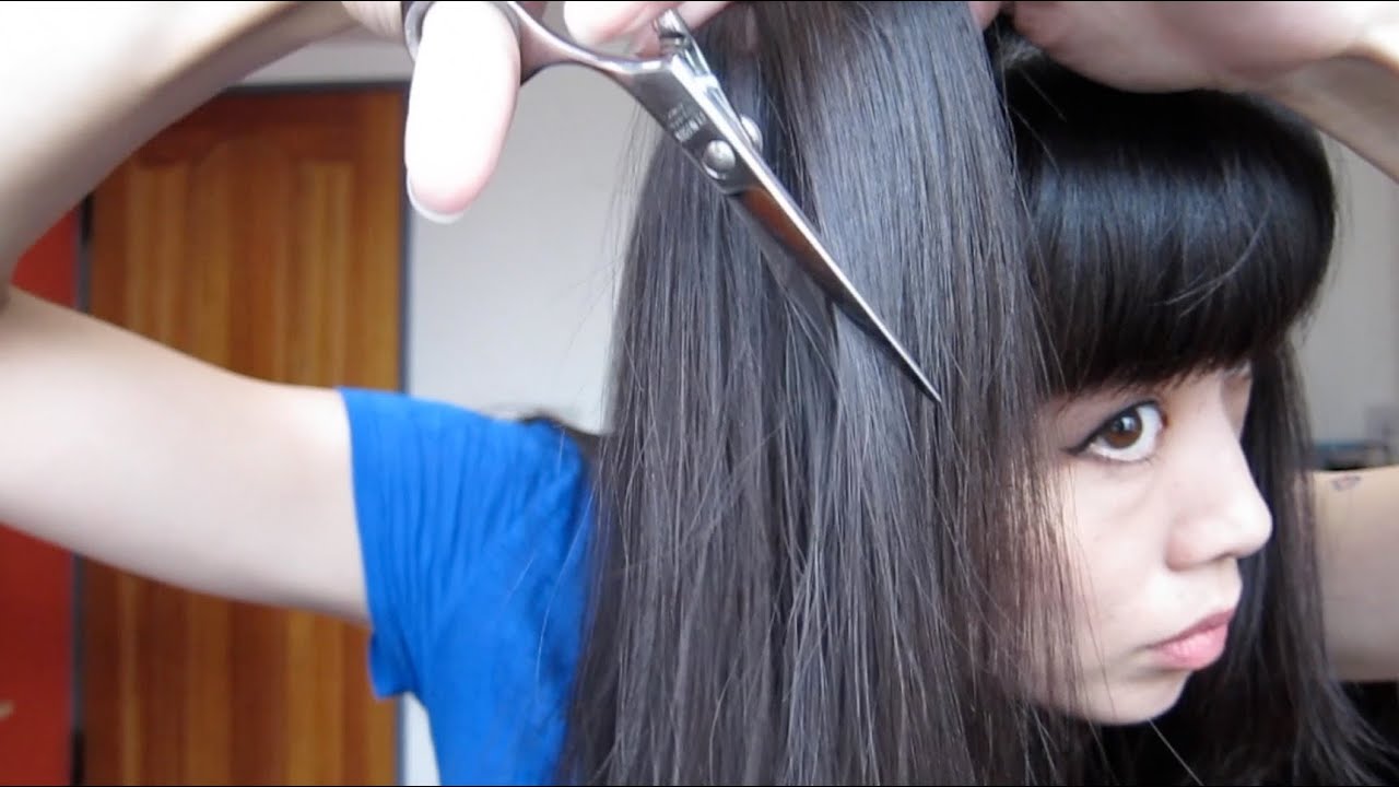 How to thin out your hair with shears or a razor