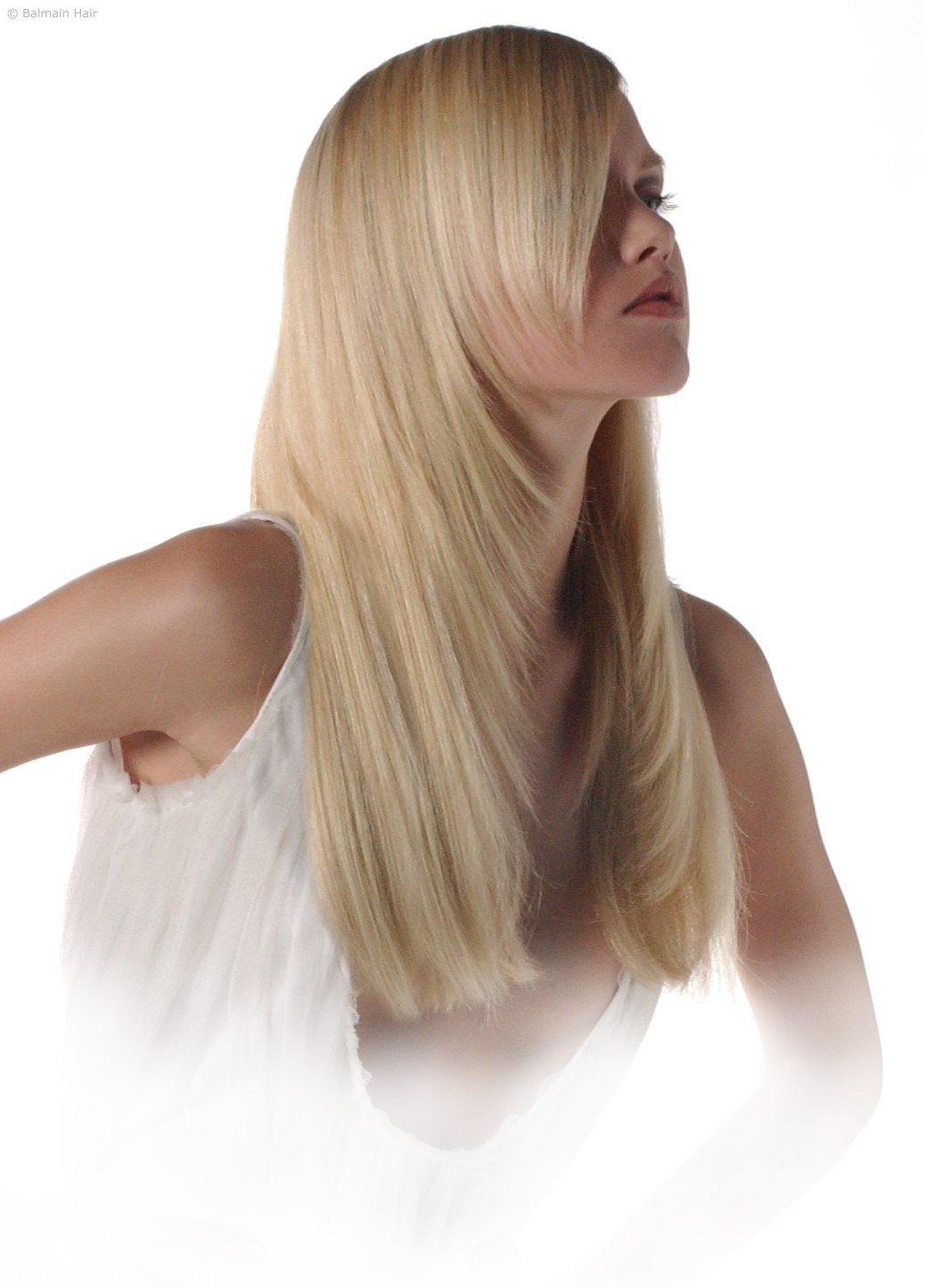 Model with fine hair and extensions